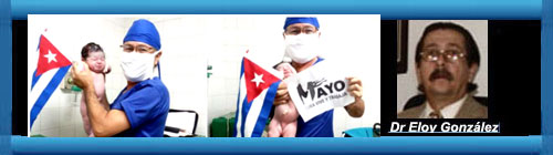 Un mdico cubano exhibe como un trofeo ofertorio, a una beb recin nacida en celebracin del 1ro de Mayo. Por el Dr. Eloy A Gonzlez.     CUBADEMOCRACIAYVIDA.ORG                                                                                                                                                      web/folder.asp?folderID=136