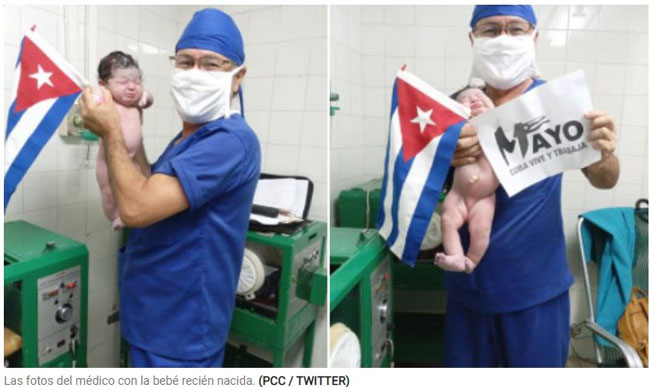 Un mdico cubano exhibe como un trofeo ofertorio, a una beb recin nacida en celebracin del 1ro de Mayo. Por el Dr. Eloy A Gonzlez.     CUBADEMOCRACIAYVIDA.ORG                                                                                                                                                      web/folder.asp?folderID=136